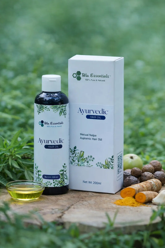 Blu Essentials Ayurvedic Hair Oil in a 200mL bottle, ideal for hair fall and positive growth, featuring natural ingredients.