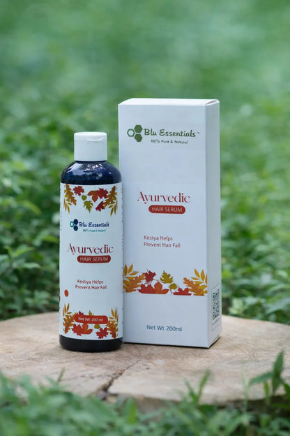 Blu Essentials Ayurvedic Hair Serum 200mL in a sleek bottle, designed for hair care and promoting healthy growth.