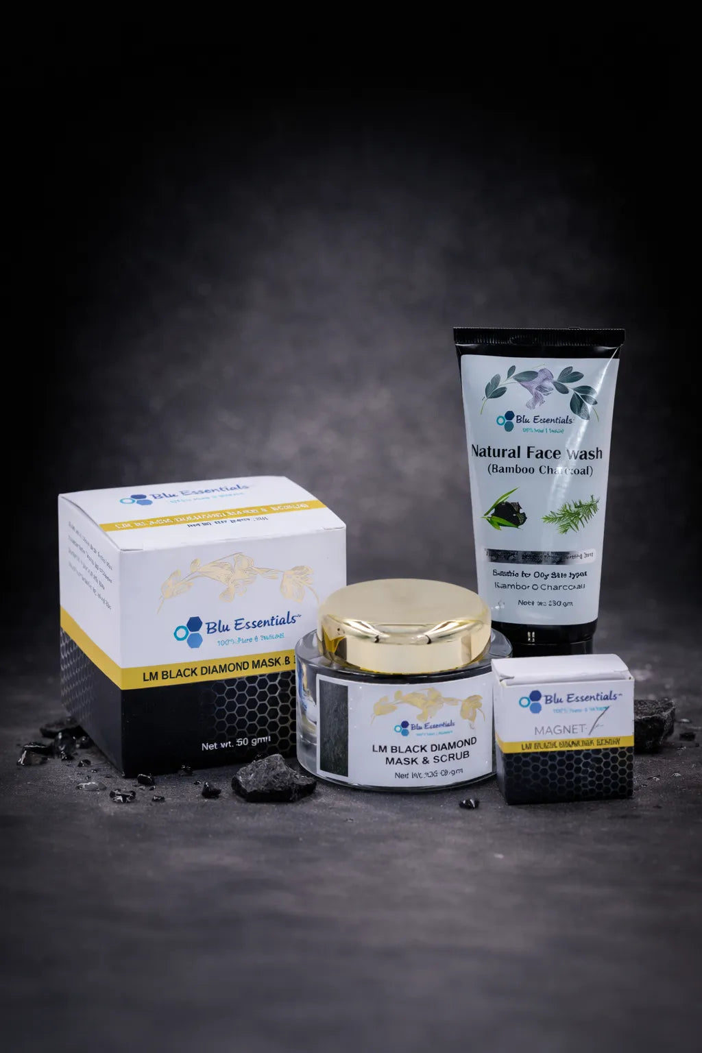 Blu Essentials Black Diamond Scrub + Mask in 100g size, featuring a sleek black packaging, perfect for skin care and exfol...