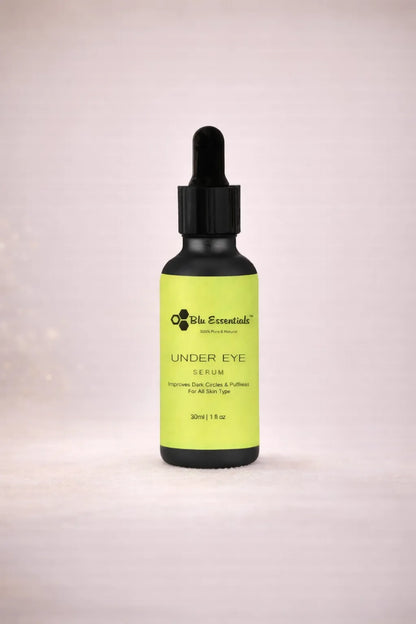 Blu Essentials Under Eye Serum 30ml in a sleek bottle, featuring natural ingredients like Aloe Vera and Green Tea for skin...