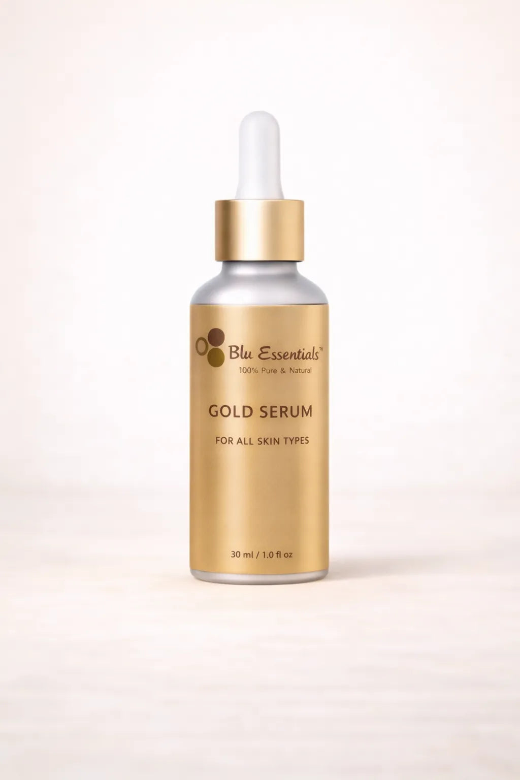 Gold Serum for Face by Blu Essentials in a 30mL bottle, featuring luxurious gold flakes, perfect for skin care and anti-ag...